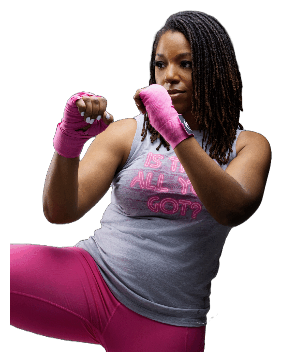 A woman in a confident, empowered fighting stance