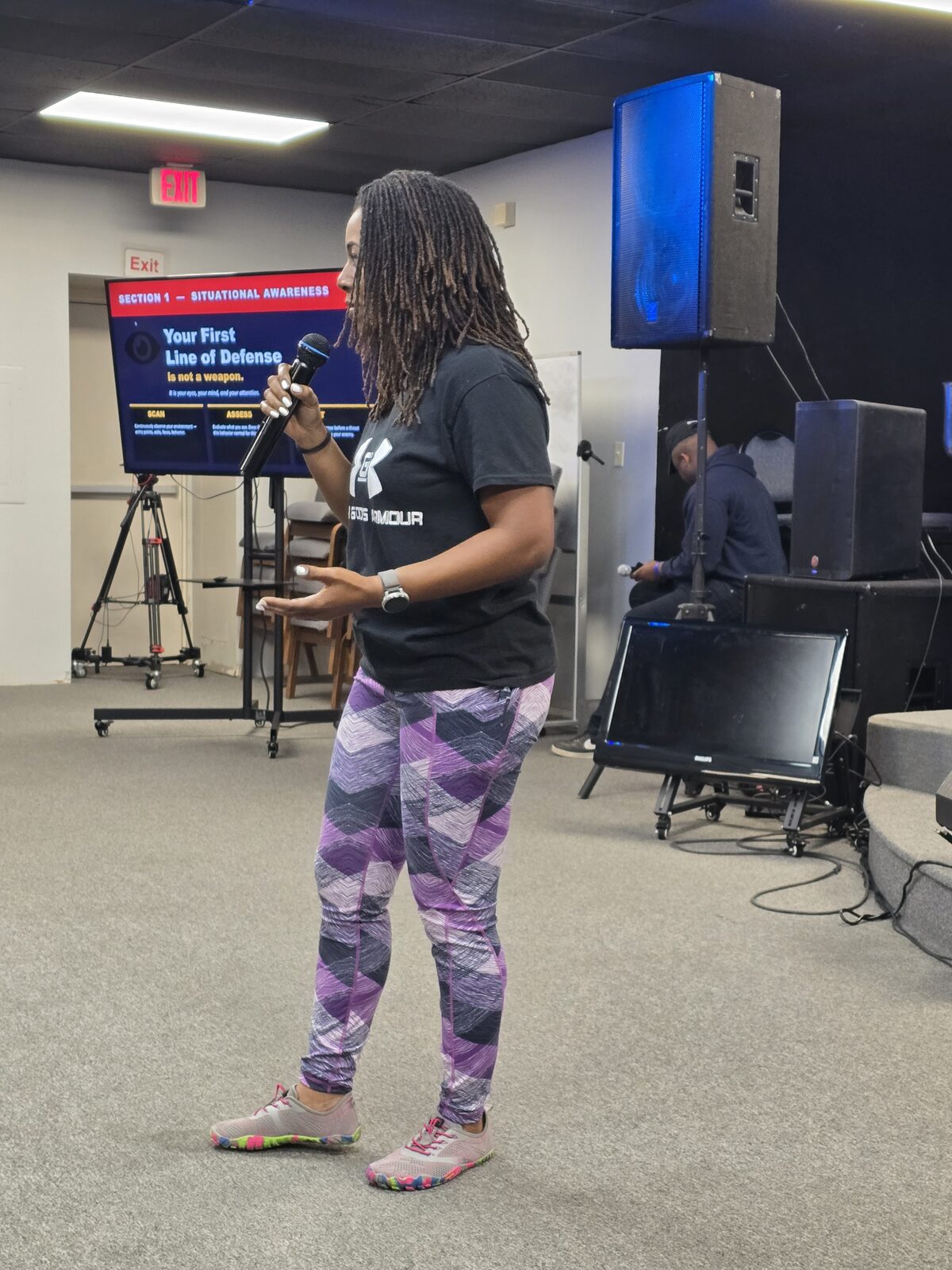 Casilda leading a situational awareness and self-defense workshop